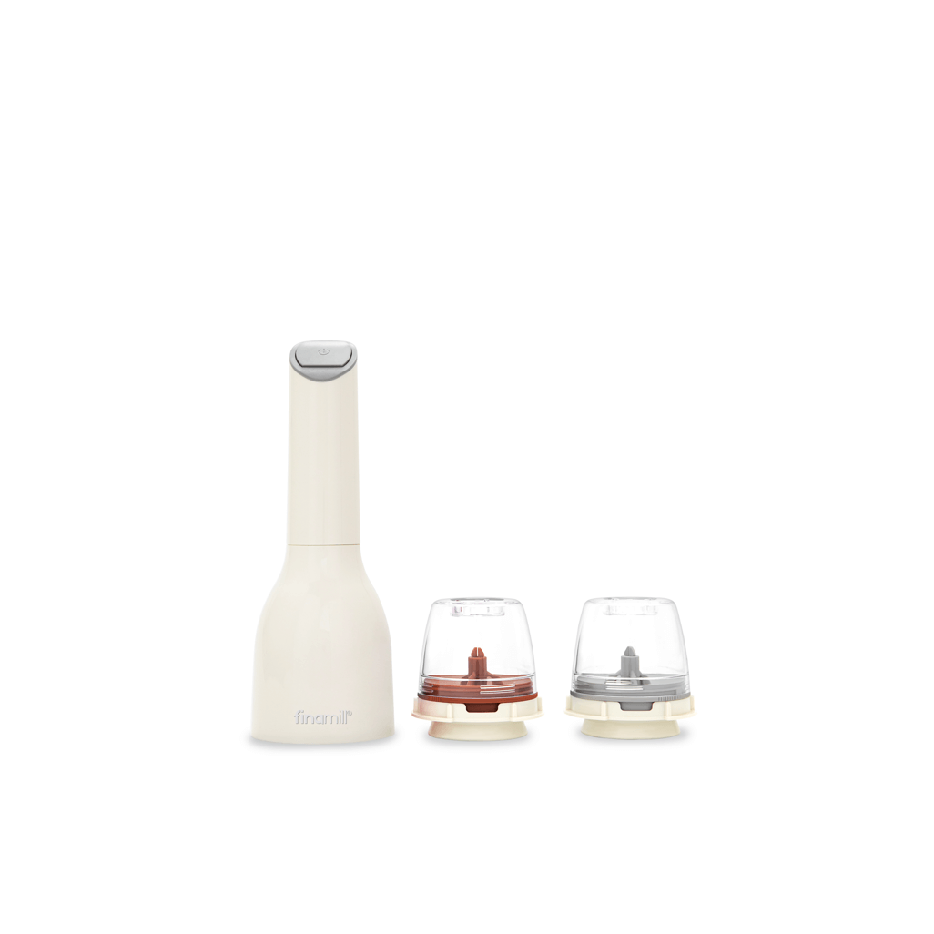 FINAMILL battery-operated grinder in soft cream with two interchangeable containers for grinding spices.