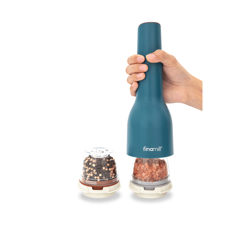 FINAMILL rechargeable grinder in ocean blue being used with spice containers, perfect for fresh seasoning.