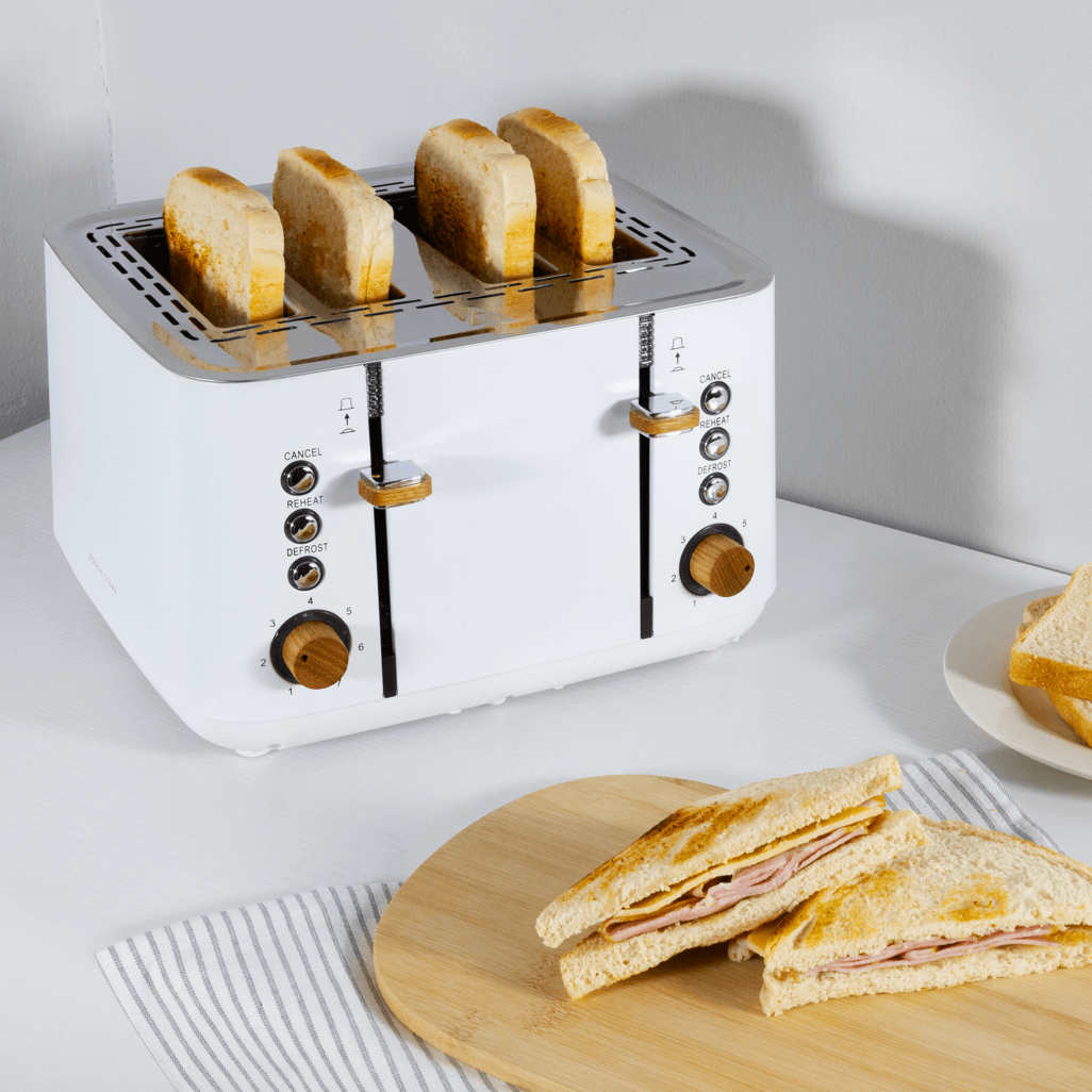 Boden Stark Anson Collection 4 Slice Toaster in white with toasted bread, featuring genuine oak knobs and stainless steel accents.