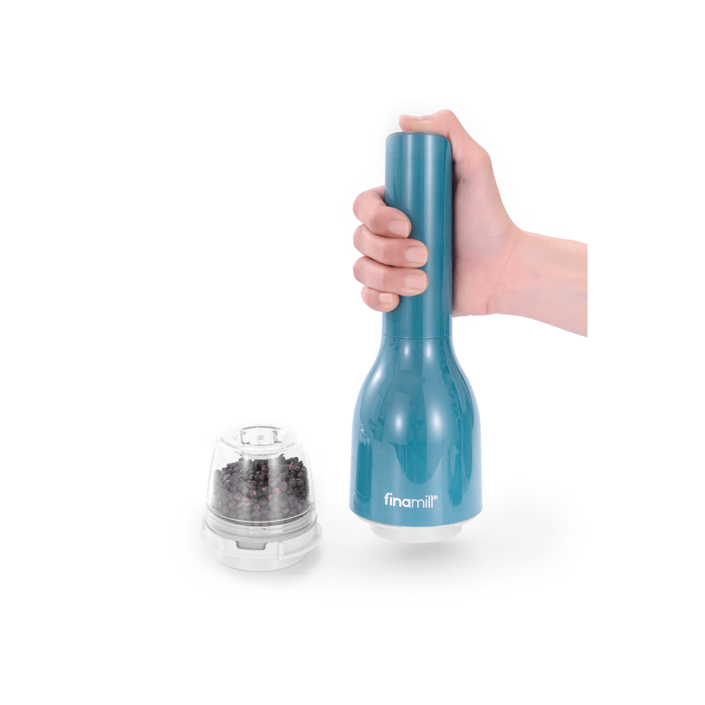 FINAMILL battery-operated grinder in ocean blue, held in hand with detachable grinding container.