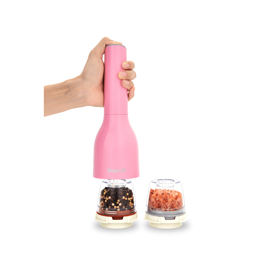 FINAMILL pink battery-operated grinder in hand, showcasing spice containers on a white background.