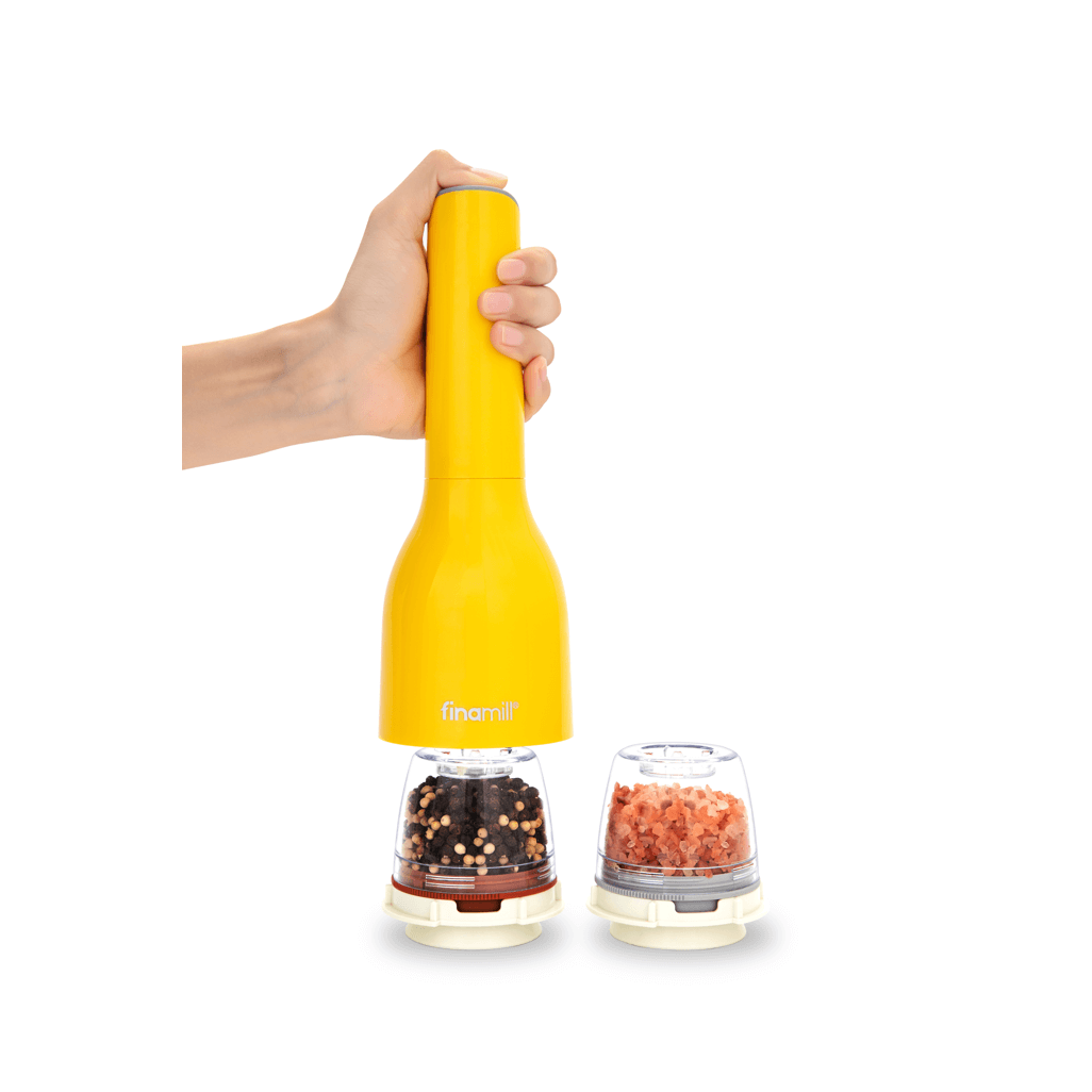 FINAMILL battery-operated grinder in Canary color with spice containers for fresh grinding.