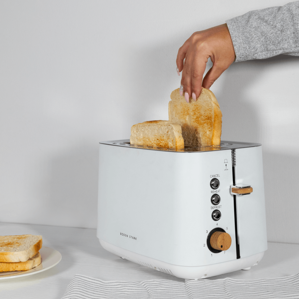Boden Stark Anson Collection 2 Slice SSToaster White with toasting bread slices, ideal for kitchen use.