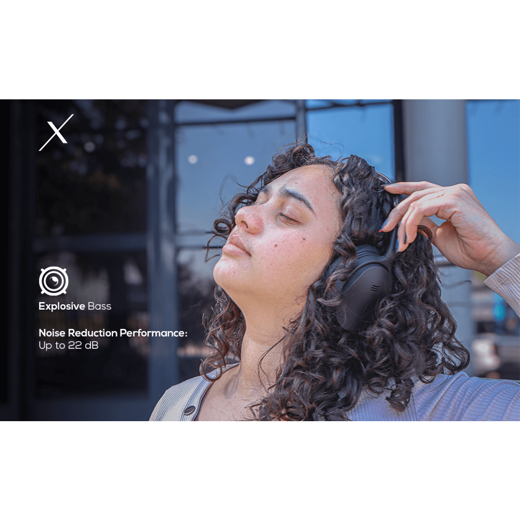 Woman enjoying the VolkanoX Silenco headphones, highlighting explosive bass and noise reduction performance.