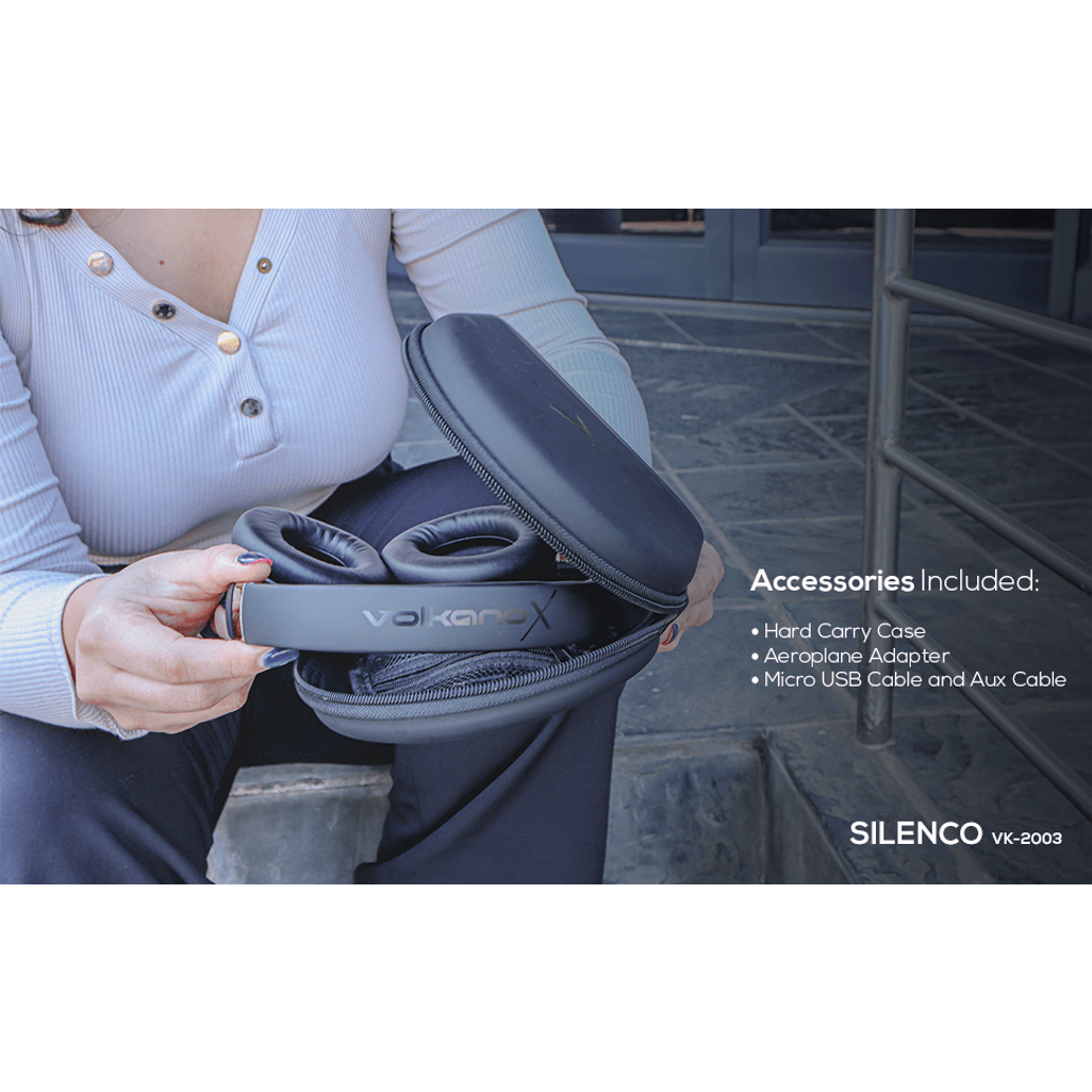 VolkanoX Silenco headphones with hard carry case and accessories, including aeroplane adapter and USB cables.