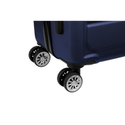 Close-up of Travelwize Maple ABS 65cm navy spinner luggage showing 4 durable wheels for easy maneuvering.