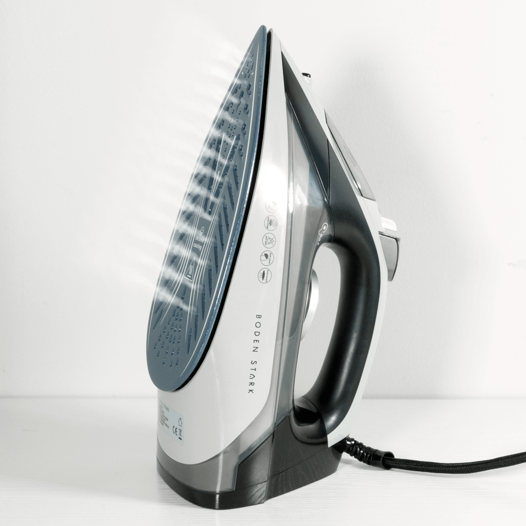Boden Stark 2200W Ceramic Steam Iron with steam function, efficient design for wrinkle-free clothes.