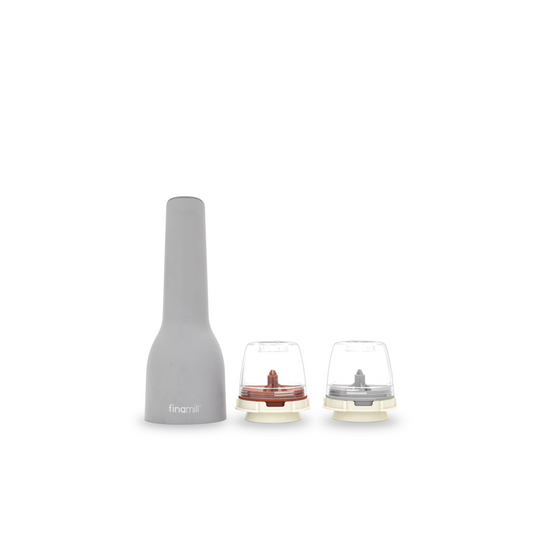 FINAMILL rechargeable grinder in gray with two interchangeable grinding containers for spices and herbs.