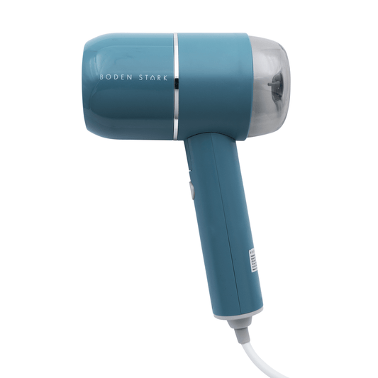 Boden Stark Handheld Steamer in blue, designed for finishing garments with ease and efficiency.