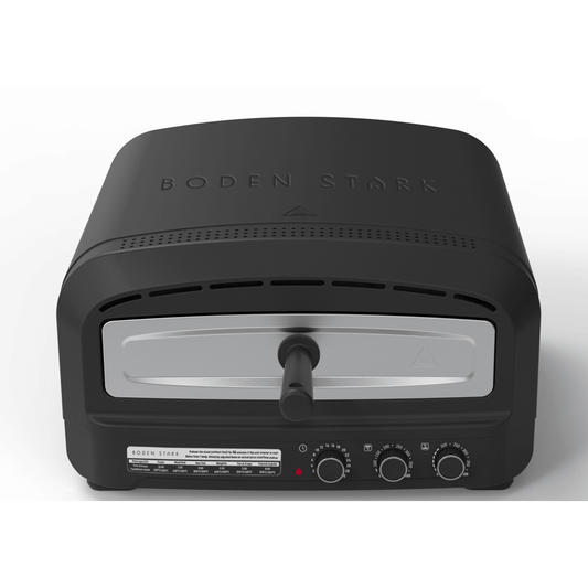 Boden Stark Manual Pizza Oven with sleek design and control knobs for outdoor cooking.