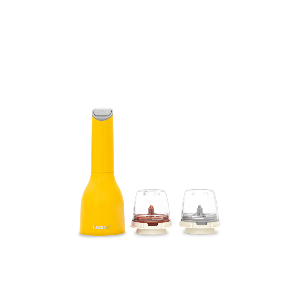 FINAMILL battery-operated grinder in Canary yellow with two interchangeable grinding cups.