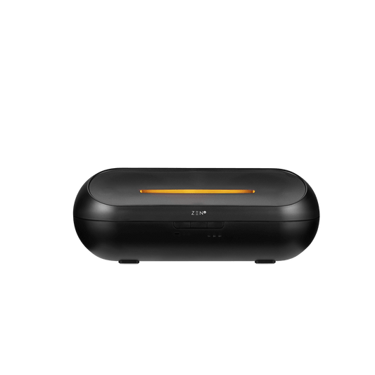 Zen Radiant Diffuser in sleek black design with a glowing orange light, perfect for enhancing your space's ambiance.