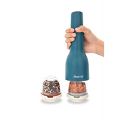 FINAMILL rechargeable grinder in ocean blue being used with spice containers, perfect for fresh seasoning.