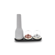 FINAMILL rechargeable stone grinder with two colorful containers on a black base for versatile spice grinding.