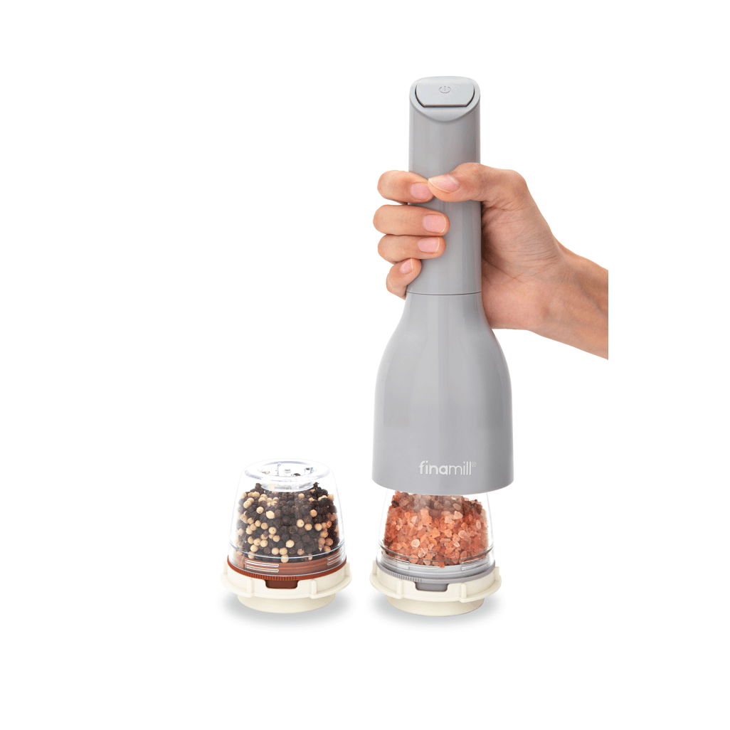 FINAMILL battery-operated grinder with interchangeable stone containers for spices and herbs.