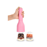 FINAMILL pink battery-operated grinder in hand, showcasing spice containers on a white background.