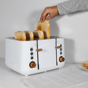 Boden Stark Anson Collection 4 Slice Toaster in white with red oak knobs toasting bread slices.