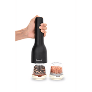 Hand holding FINAMILL RECHARGEABLE grinder in Midnight Black with spice containers on the side.