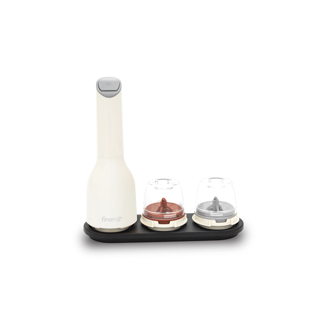 FINAMILL battery-operated grinder in soft cream with two interchangeable cups for spices.