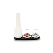 FINAMILL rechargeable grinder in soft cream color with two detachable spice containers on a black base.
