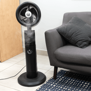 BODEN STARK 3-in-1 fan humidifier in a modern living room setting with mist effect.
