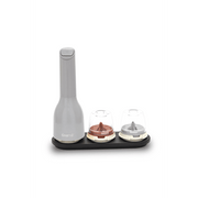 FINAMILL battery-operated grinder in gray with two grinding chambers on a black base for versatile spice grinding.