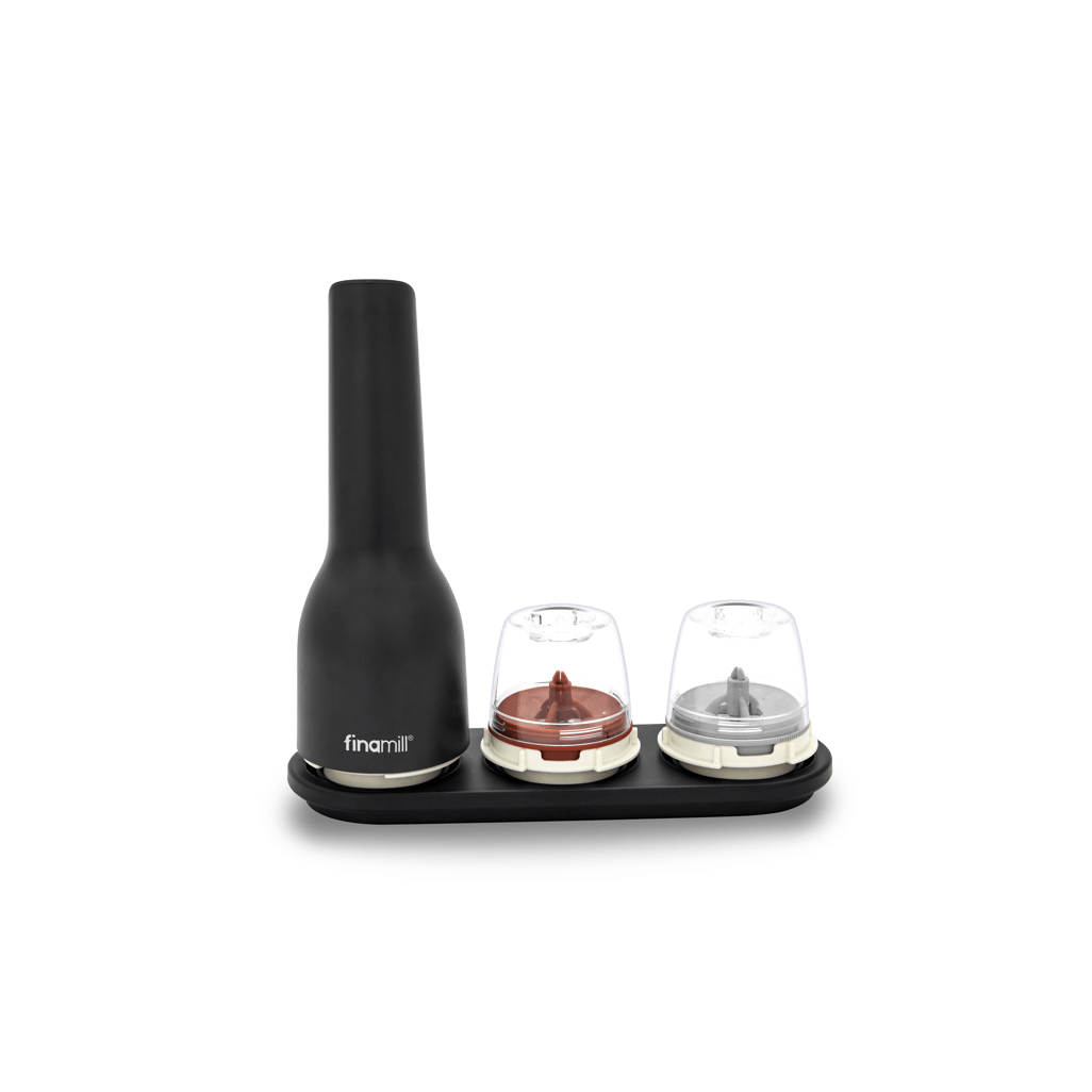 FINAMILL rechargeable grinder in Midnight Black with two spice containers on a base.