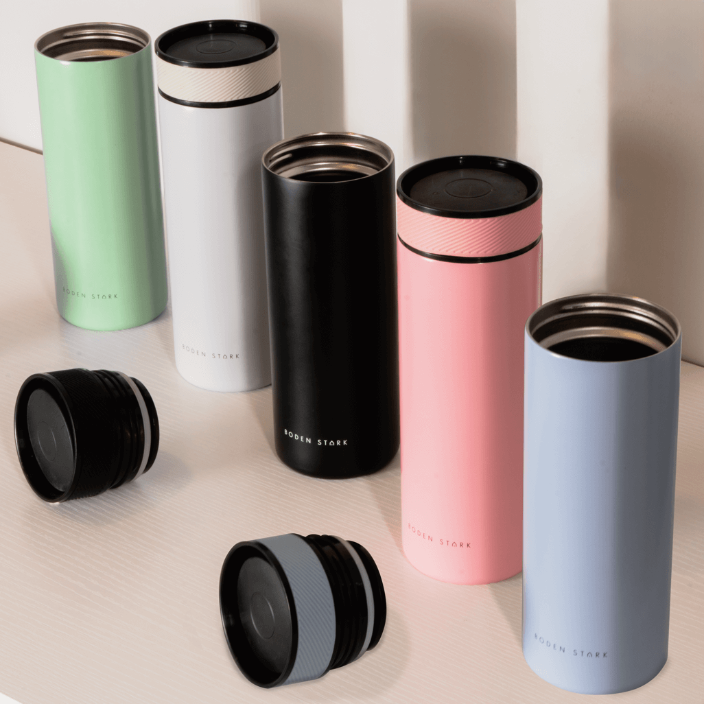Boden Stark double-walled flasks in various colors, showcasing the 650ml capacity and sleek design.