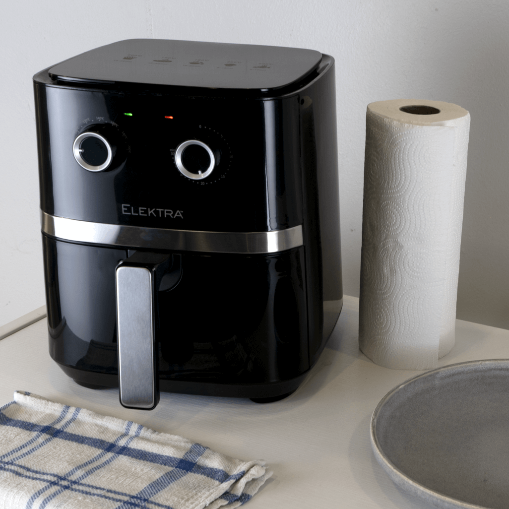 Black ELEKTRA 5L Mechanical Air Fryer with simple dial controls on a kitchen counter.