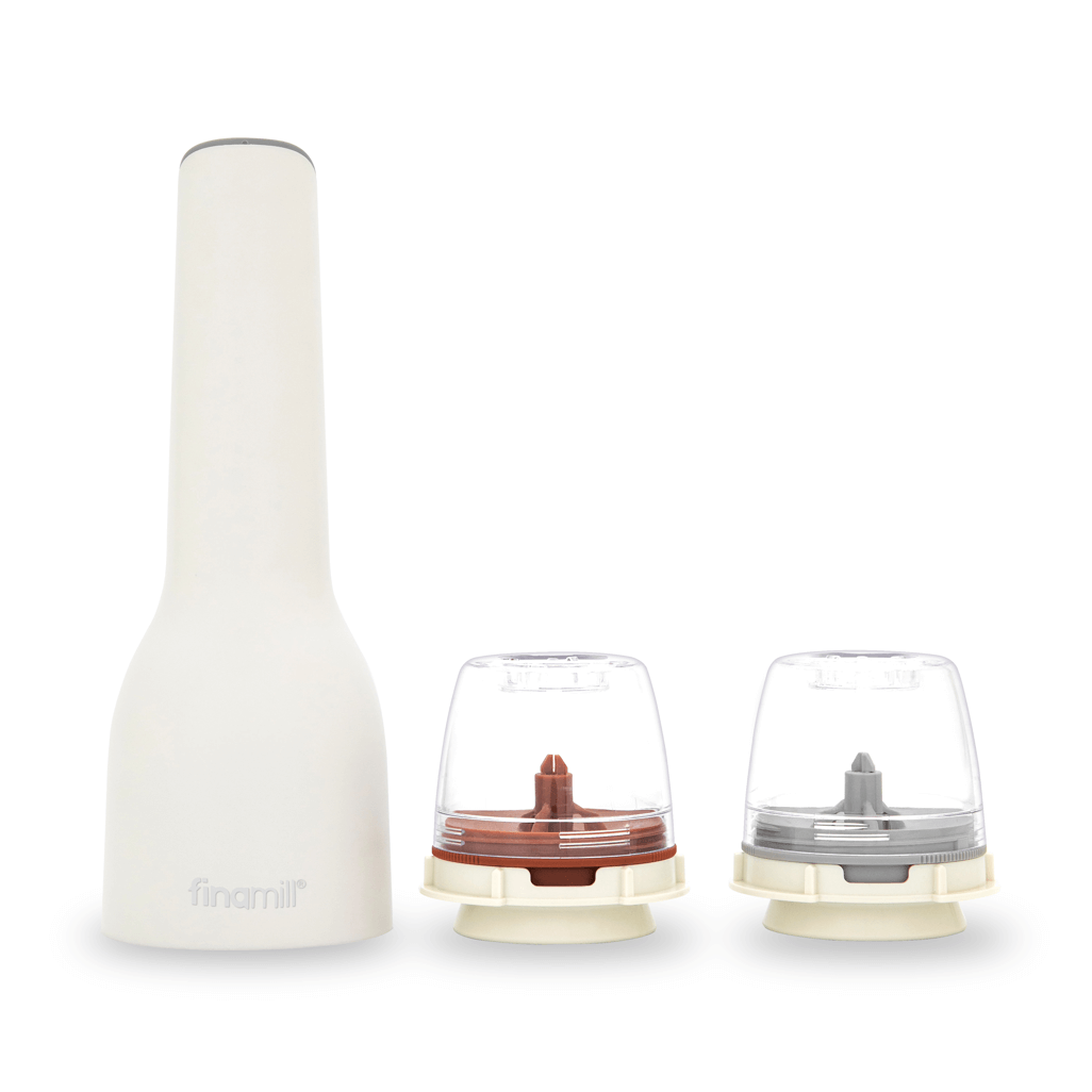 FINAMILL rechargeable grinder in soft cream with two color-coded grinding containers.